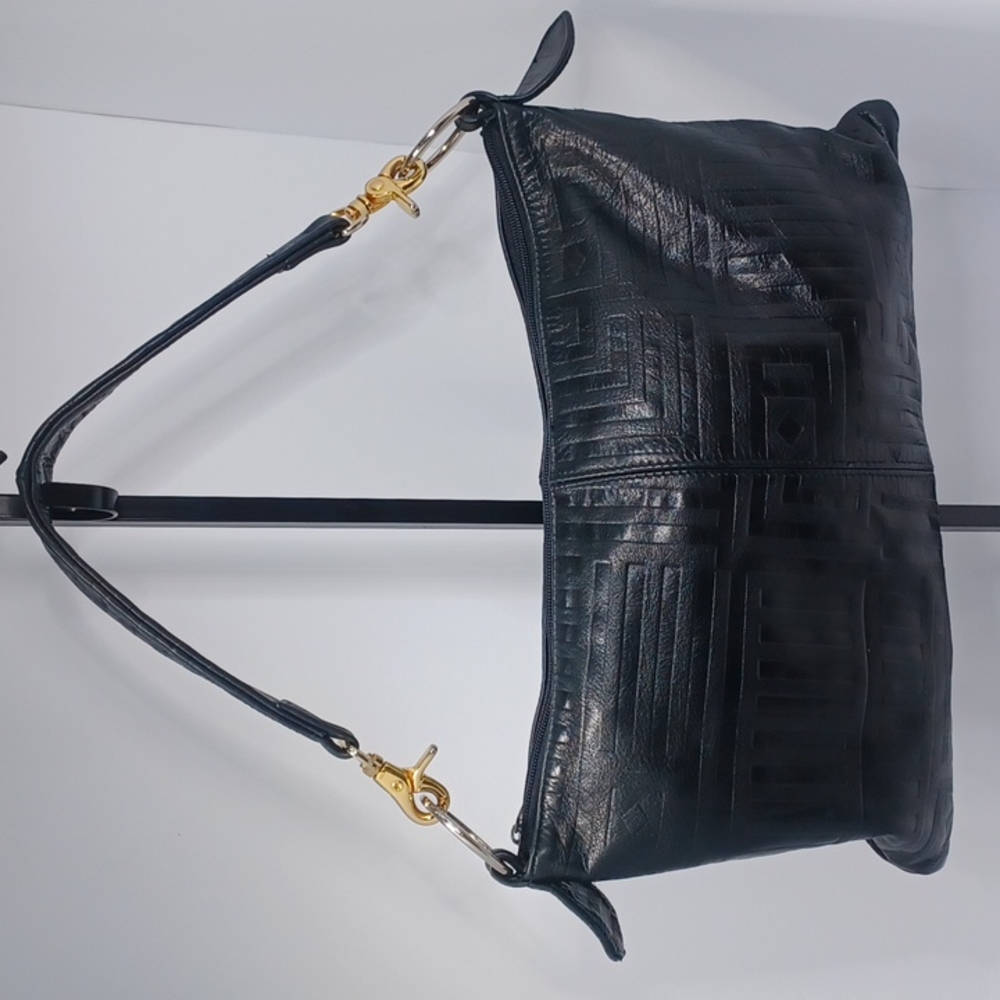 Andre Oliver black embossed butter soft leather shoulder bag with gold hardware.
